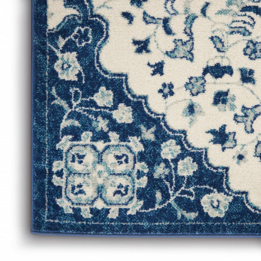 5' X 7' Blue And Ivory Power Loom Area Rug