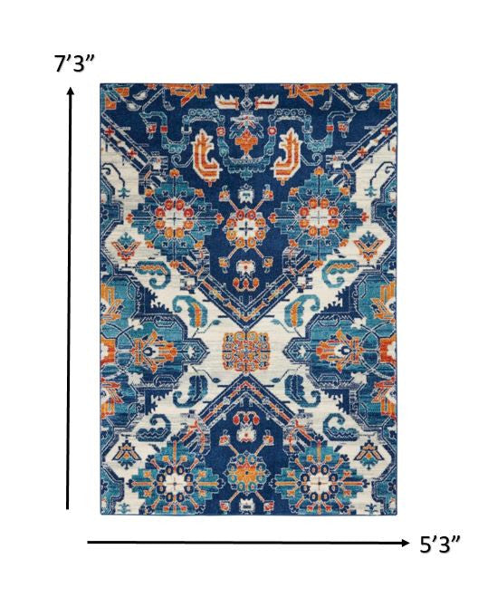 5' X 7' Blue And Ivory Floral Power Loom Area Rug