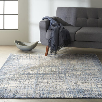 5' X 7' Gray And Ivory Abstract Distressed Area Rug