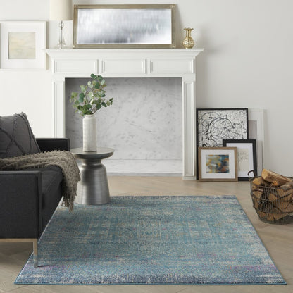 5' X 7' Blue And Ivory Southwestern Distressed Area Rug