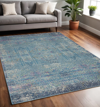 5' X 7' Blue And Ivory Southwestern Distressed Area Rug