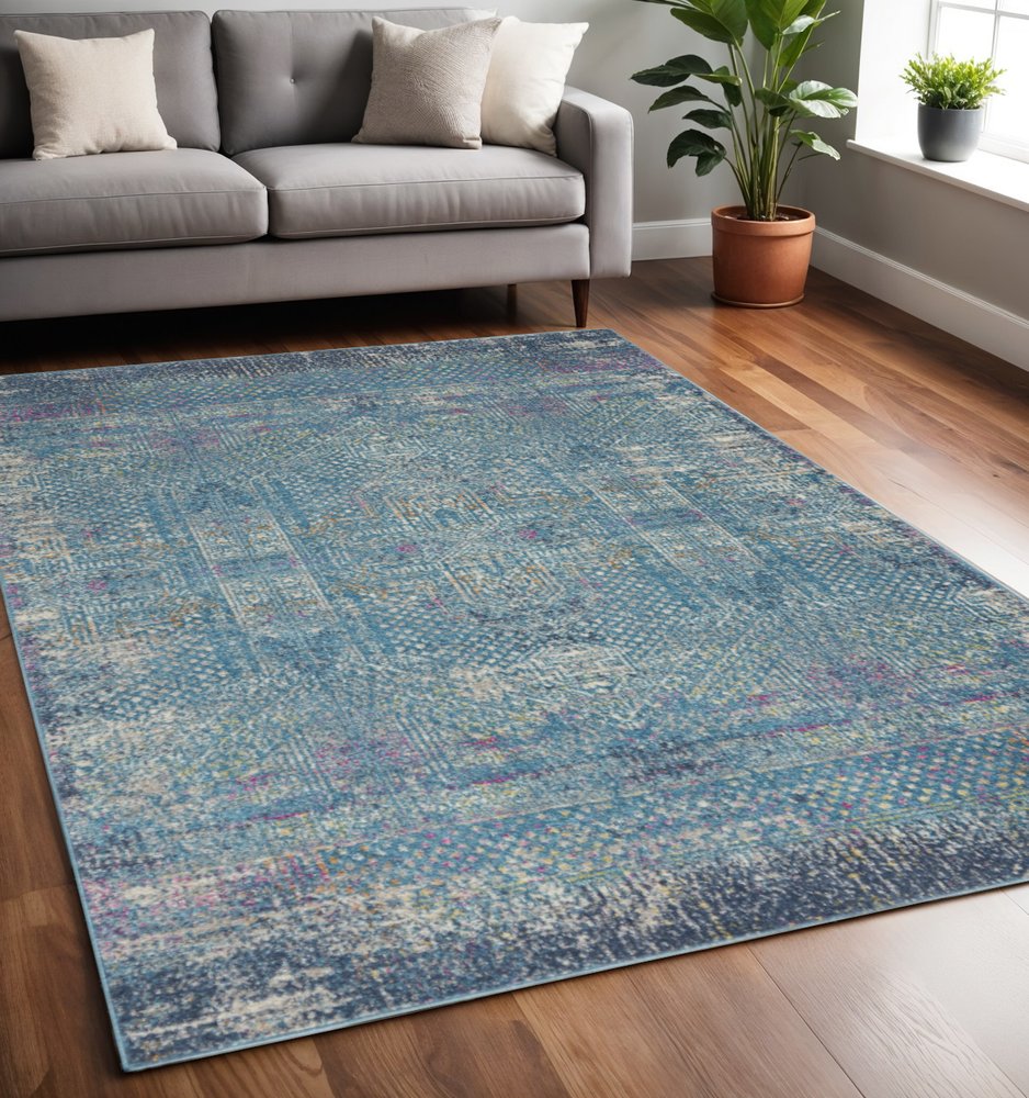 5' X 7' Blue And Ivory Southwestern Distressed Area Rug