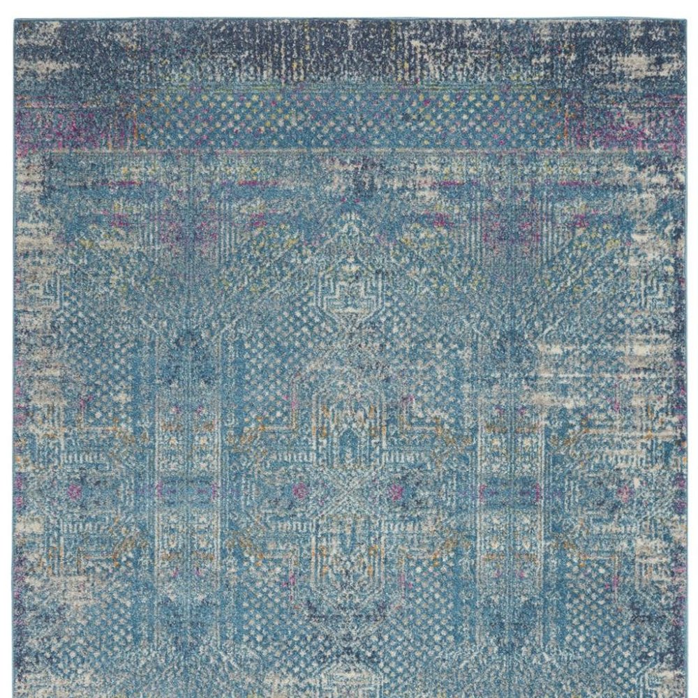 5' X 7' Blue And Ivory Southwestern Distressed Area Rug