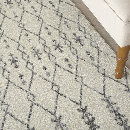 5' X 7' Gray And Ivory Geometric Distressed Area Rug