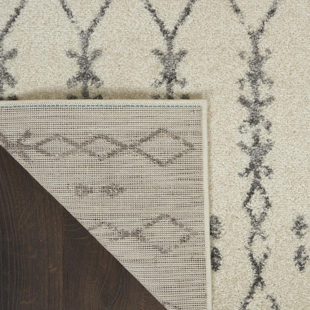 5' X 7' Gray And Ivory Geometric Distressed Area Rug