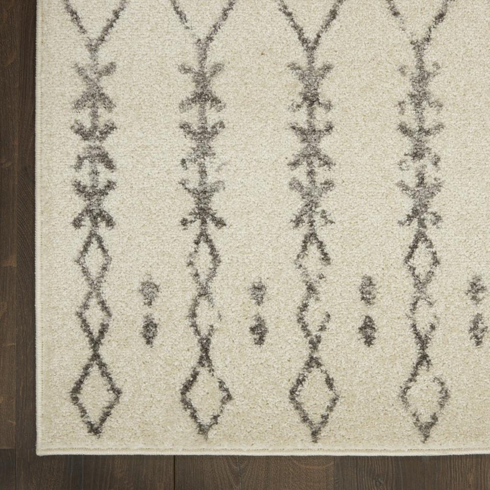 5' X 7' Gray And Ivory Geometric Distressed Area Rug