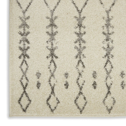 5' X 7' Gray And Ivory Geometric Distressed Area Rug