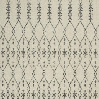 5' X 7' Gray And Ivory Geometric Distressed Area Rug