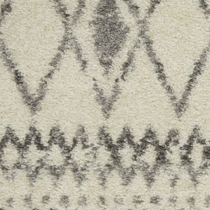 5' X 7' Gray And Ivory Geometric Area Rug