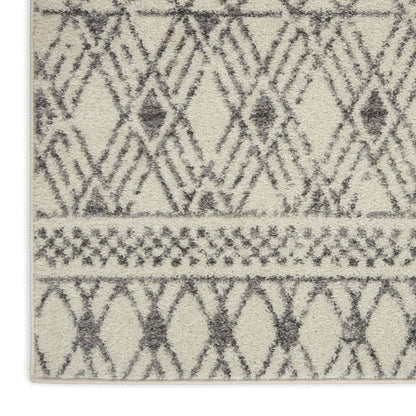 5' X 7' Gray And Ivory Geometric Area Rug