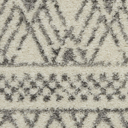5' X 7' Gray And Ivory Geometric Area Rug