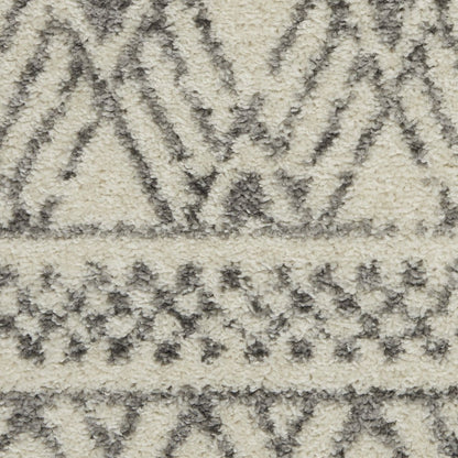 5' X 7' Gray And Ivory Geometric Area Rug