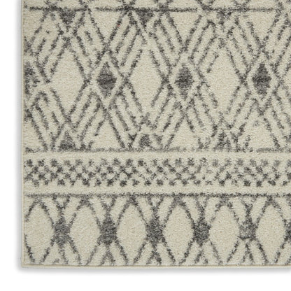 5' X 7' Gray And Ivory Geometric Area Rug