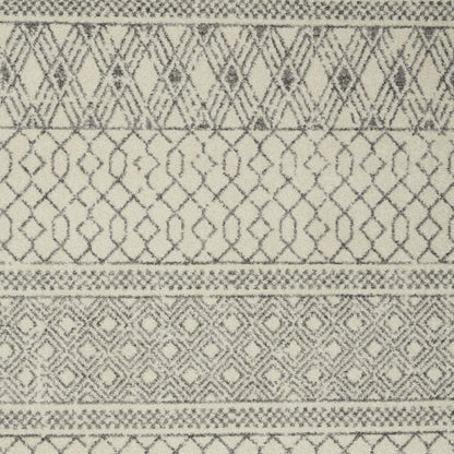 5' X 7' Gray And Ivory Geometric Area Rug