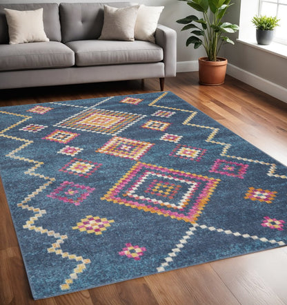 5' X 7' Navy Blue Yellow And Pink Southwestern Distressed Area Rug