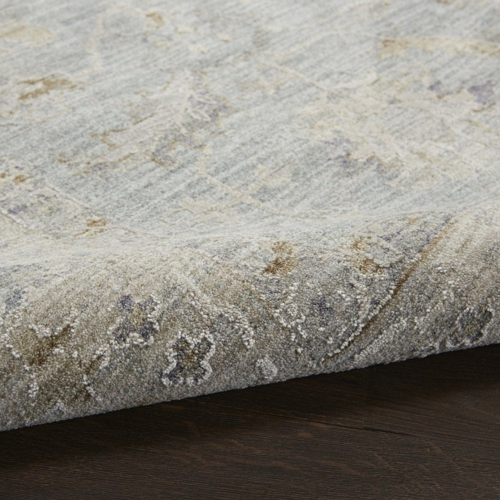 5' X 7' Ivory And Blue Geometric Area Rug