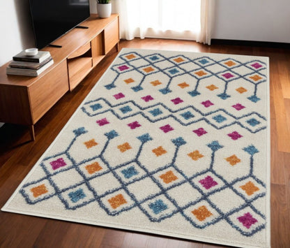 5' X 7' Ivory And Blue Geometric Area Rug