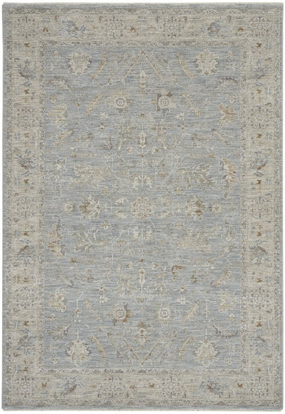 5' X 7' Ivory And Blue Geometric Area Rug