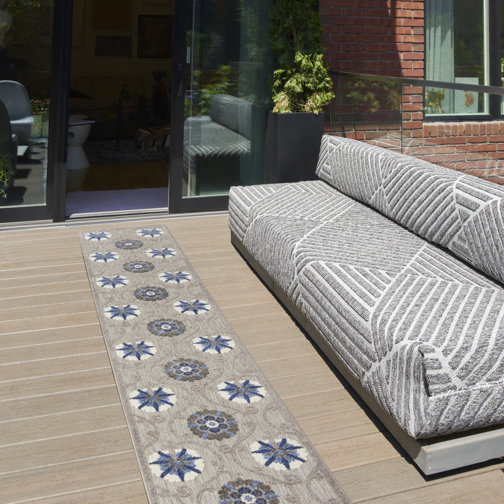 5' X 7' Ivory And Blue Geometric Area Rug