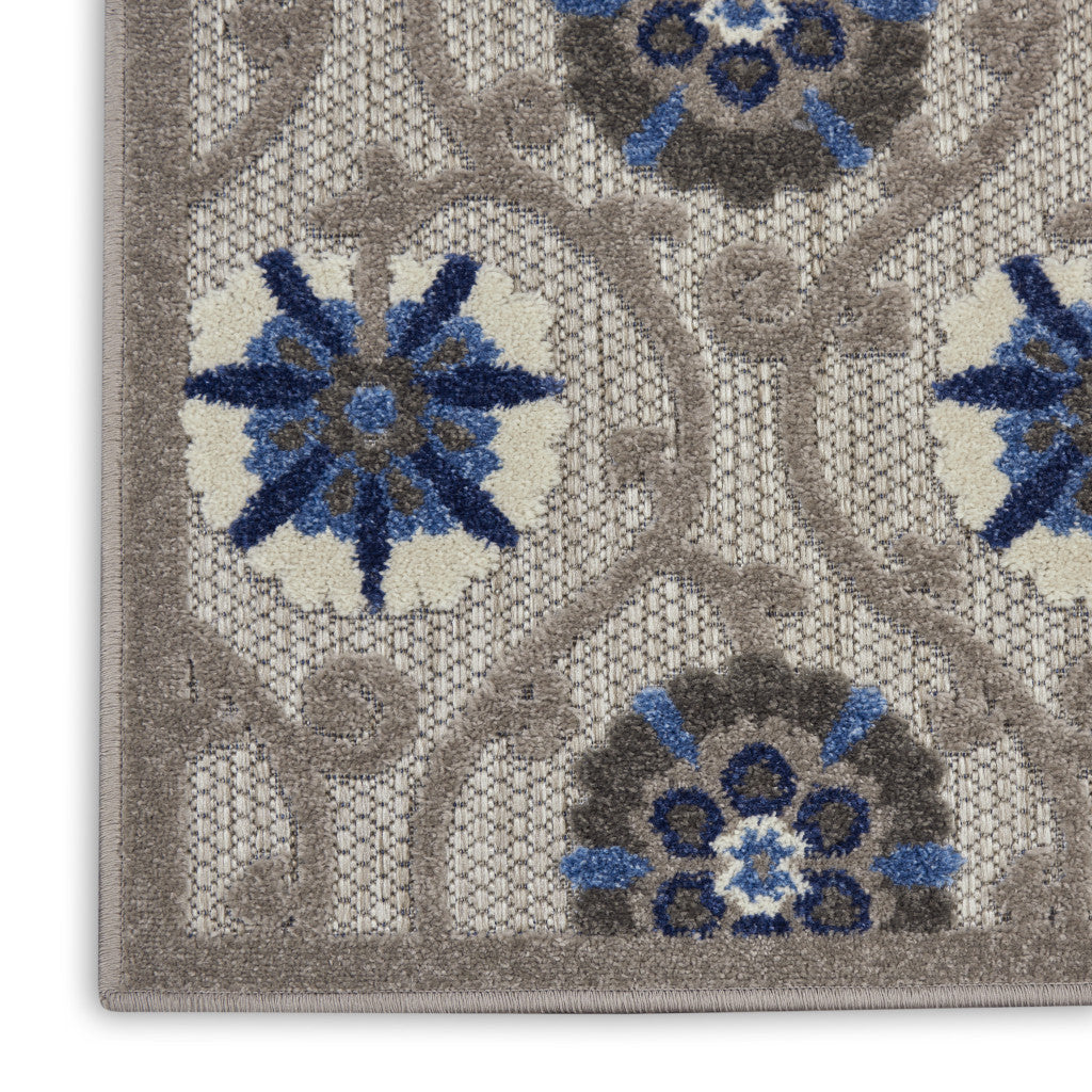 5' X 7' Ivory And Blue Geometric Area Rug