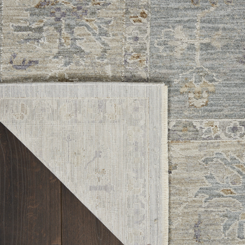 5' X 7' Blue Ivory And Pink Geometric Area Rug