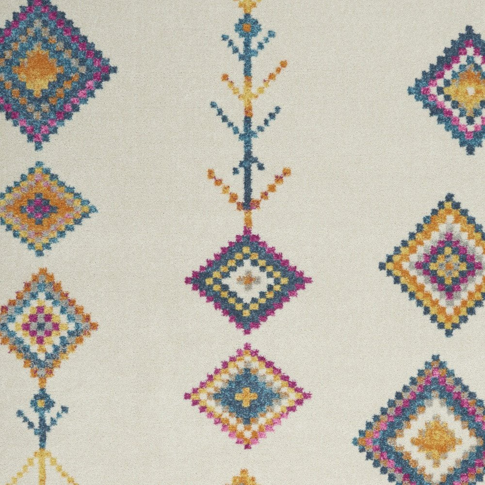 5' X 7' Blue Ivory And Pink Geometric Area Rug