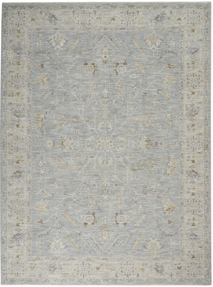 5' X 7' Blue Ivory And Pink Geometric Area Rug