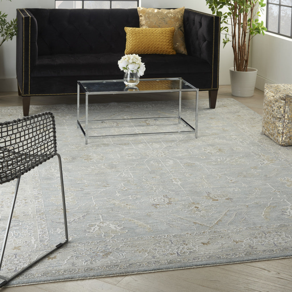 5' X 7' Blue Ivory And Pink Geometric Area Rug