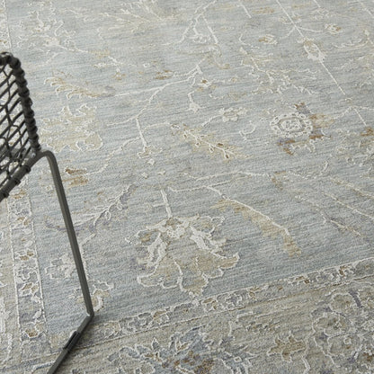 5' X 7' Blue Ivory And Pink Geometric Area Rug