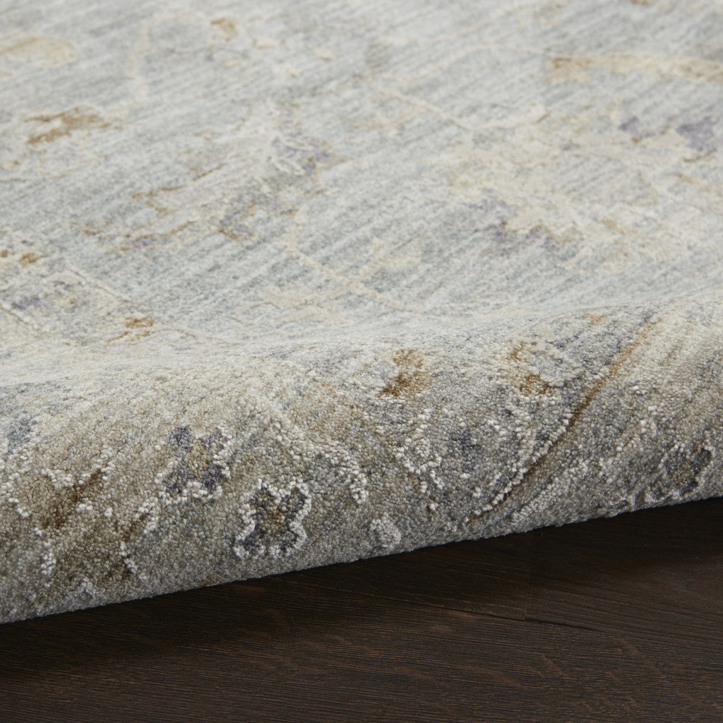 5' X 7' Blue Ivory And Pink Geometric Area Rug