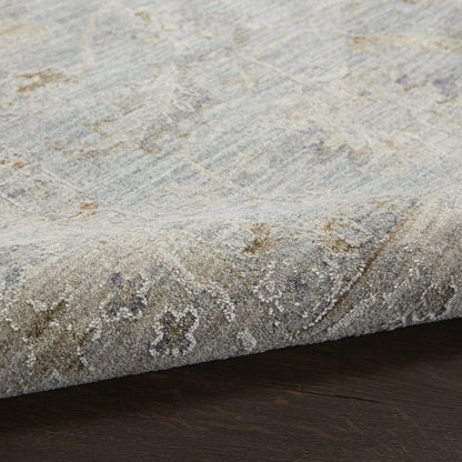 5' X 7' Blue Ivory And Pink Geometric Area Rug