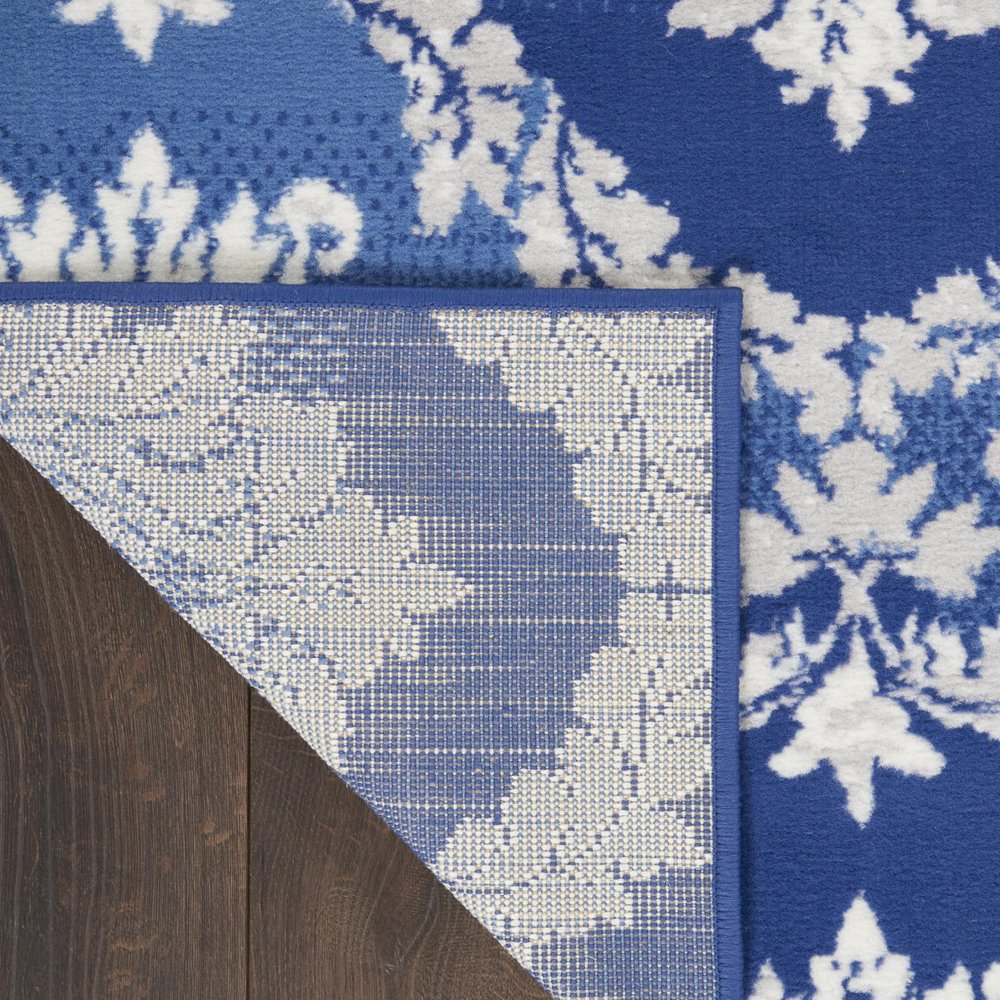 5' X 7' Ivory And Blue Damask Distressed Area Rug