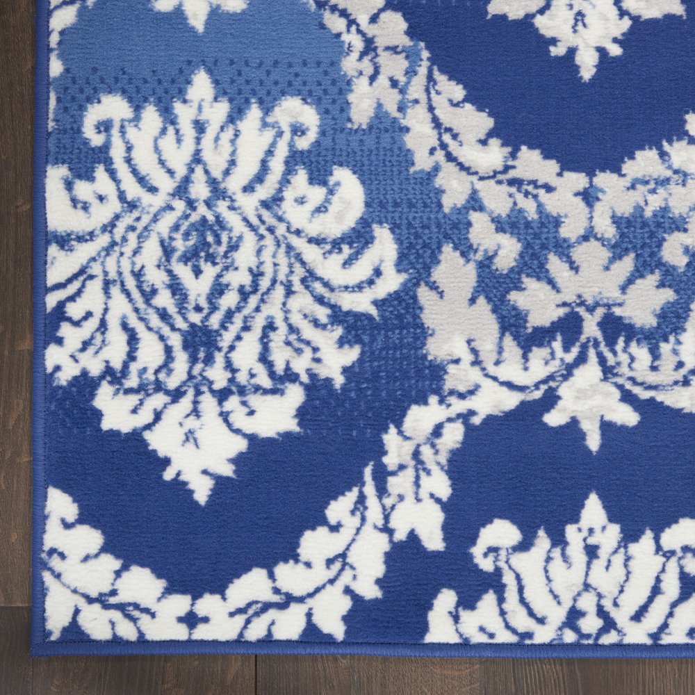 5' X 7' Blue And Ivory Damask Distressed Area Rug