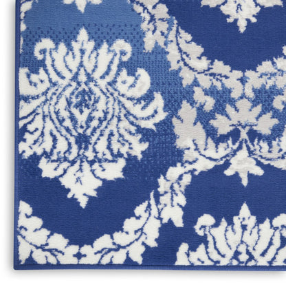 5' X 7' Ivory And Blue Damask Distressed Area Rug
