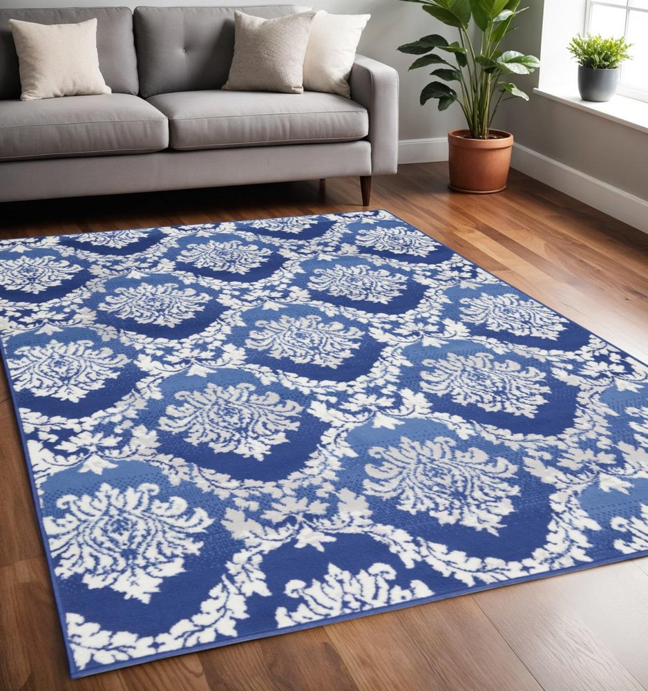 5' X 7' Ivory And Blue Damask Distressed Area Rug