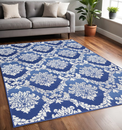 4' X 6' Blue And Ivory Damask Distressed Area Rug