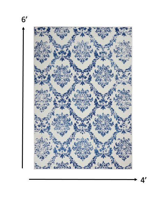 4' X 6' Blue Floral Dhurrie Area Rug
