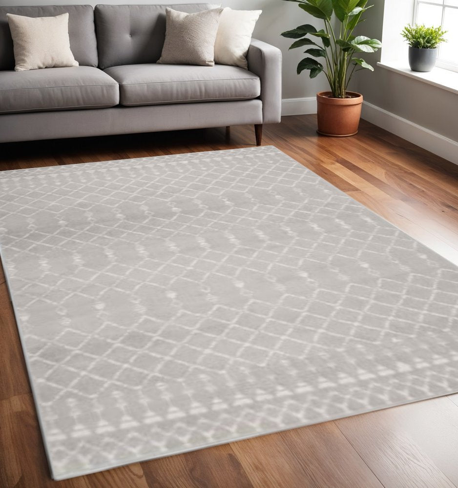 6' X 9' Ivory And Blue Geometric Area Rug