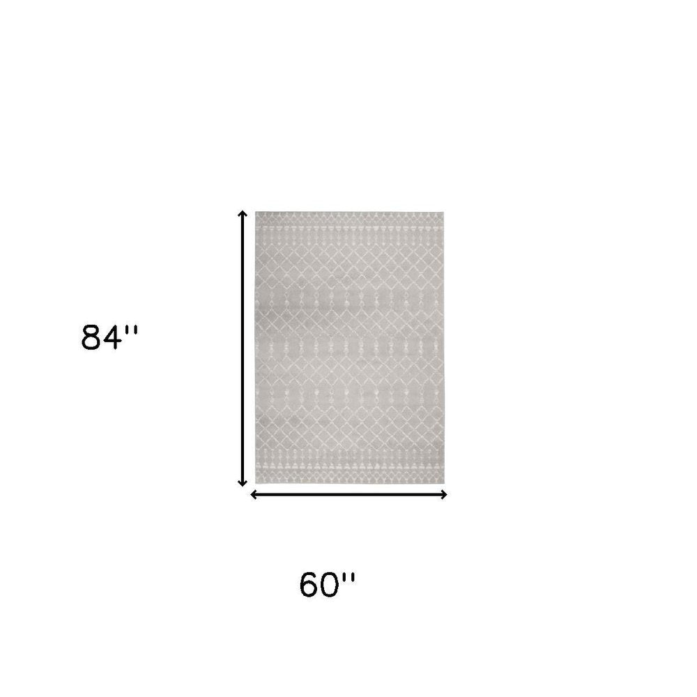 6' X 9' Ivory And Blue Geometric Area Rug