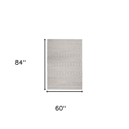5' X 7' Ivory And Blue Geometric Area Rug