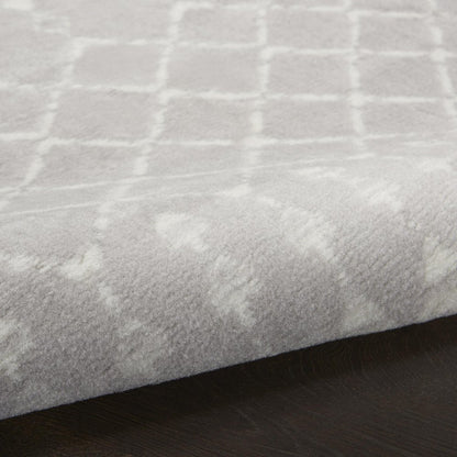 5' X 7' Gray And Ivory Geometric Area Rug