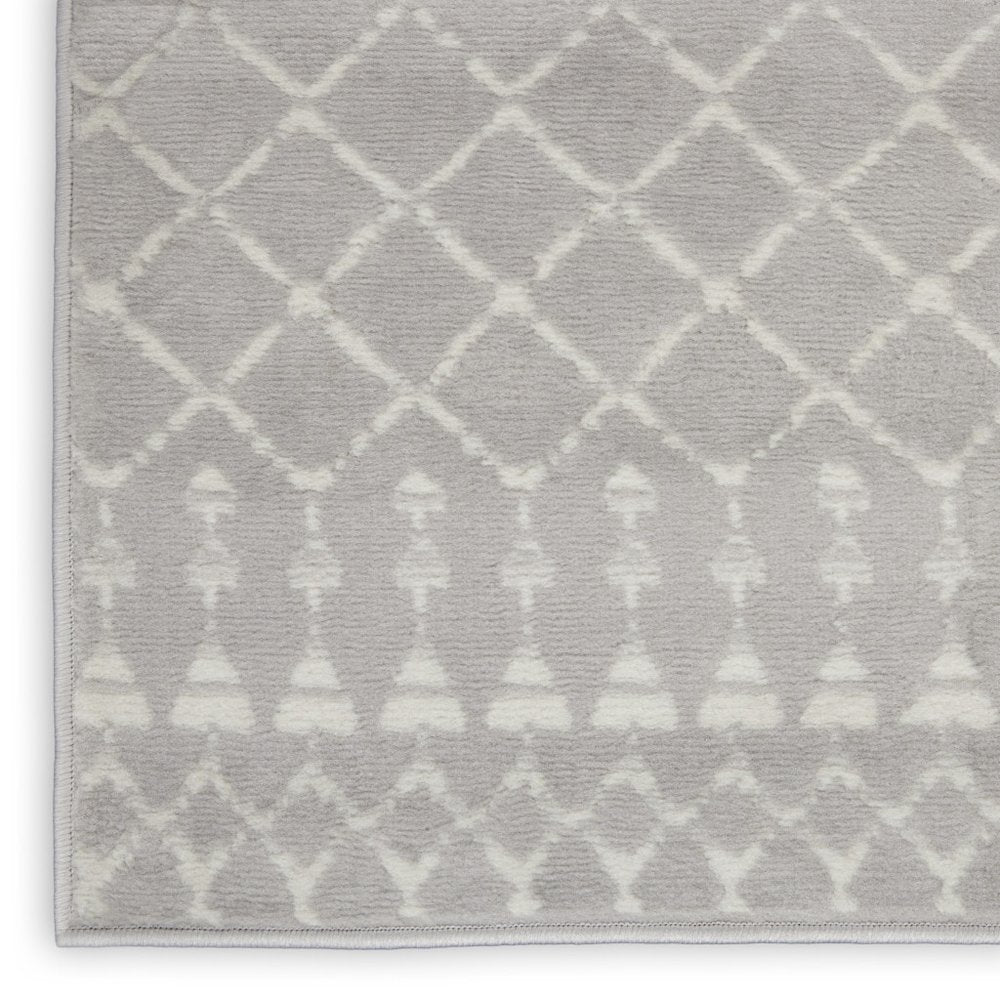5' X 7' Ivory And Blue Geometric Area Rug