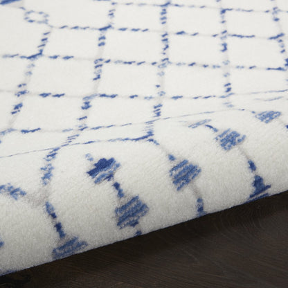 6' X 9' Ivory And Blue Geometric Area Rug