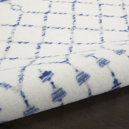 6' X 9' Ivory And Blue Geometric Area Rug