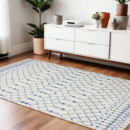 6' X 9' Ivory And Blue Geometric Area Rug