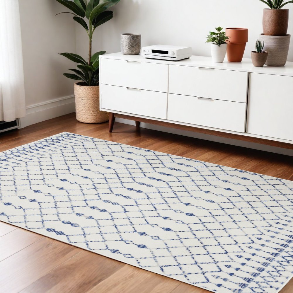6' X 9' Ivory And Blue Geometric Area Rug