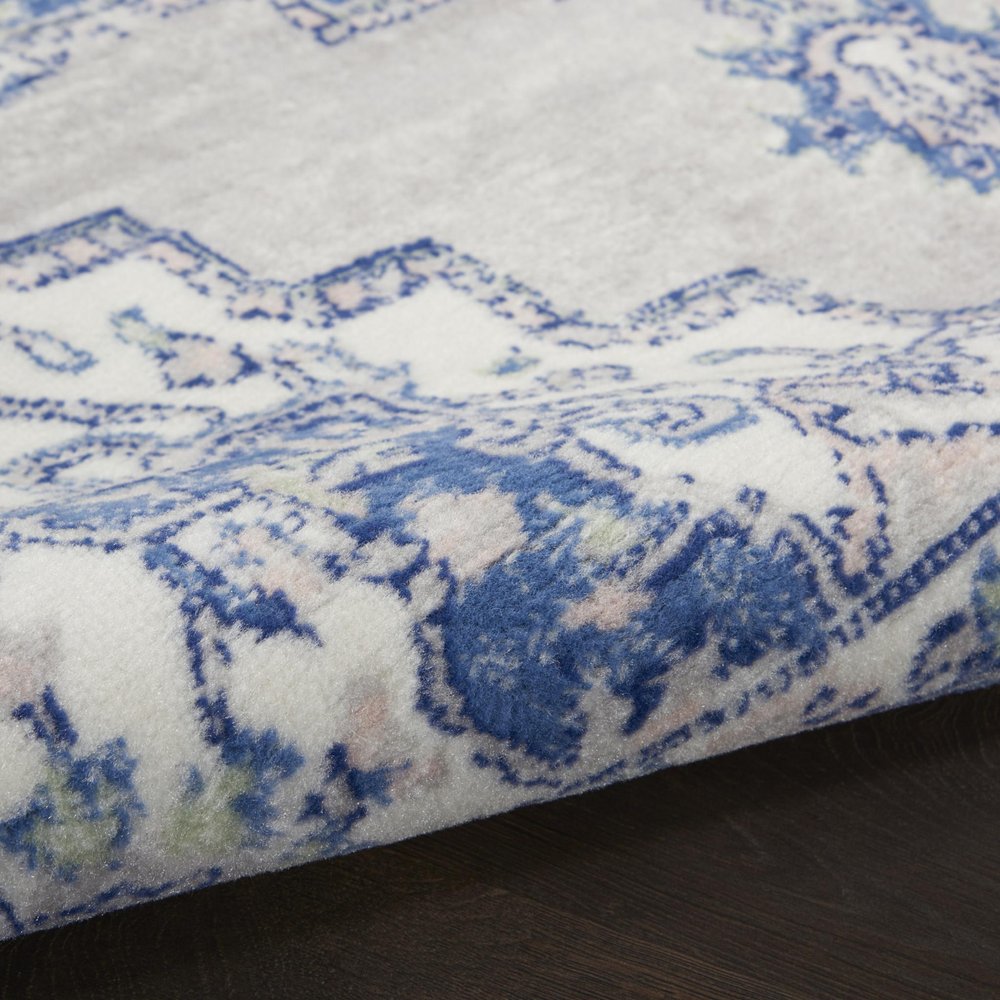 6' X 9' Ivory And Blue Floral Area Rug