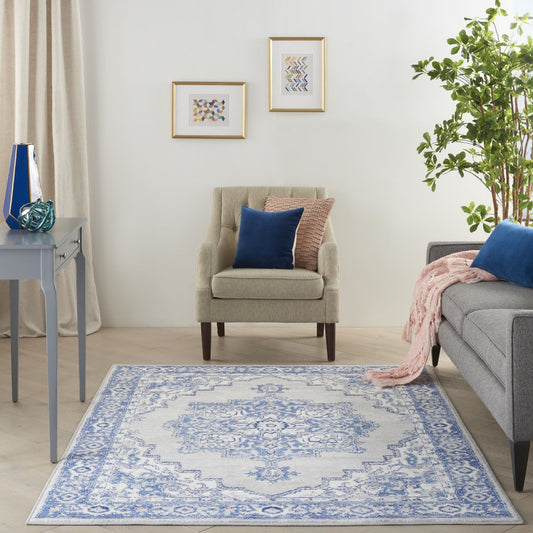 6' X 9' Ivory And Blue Floral Area Rug