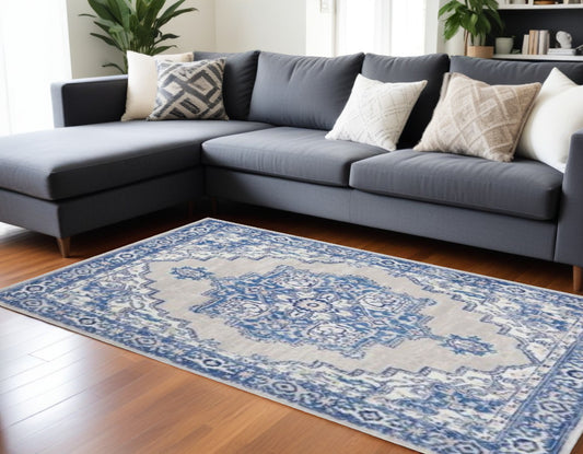 6' X 9' Blue And Ivory Floral Dhurrie Area Rug