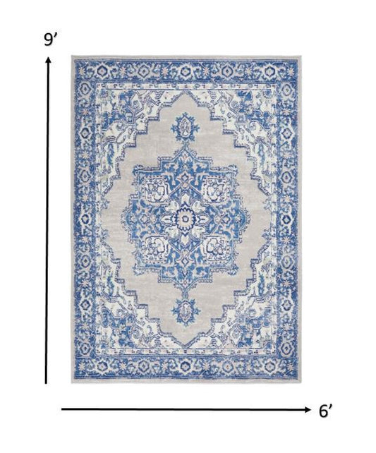 4' X 6' Blue And Ivory Floral Dhurrie Area Rug